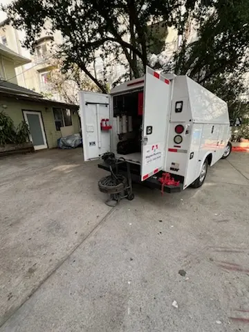 Magnet Plumbing service vehicle on-site for Grease Trap Cleaning in Julington Creek